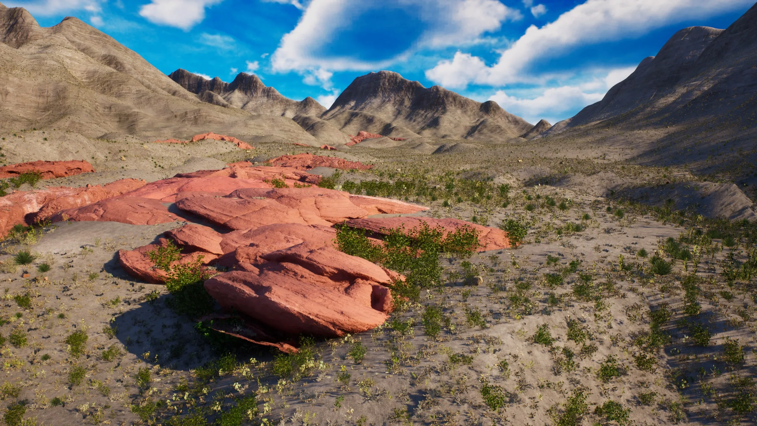 Red rock outcrops below the peaks